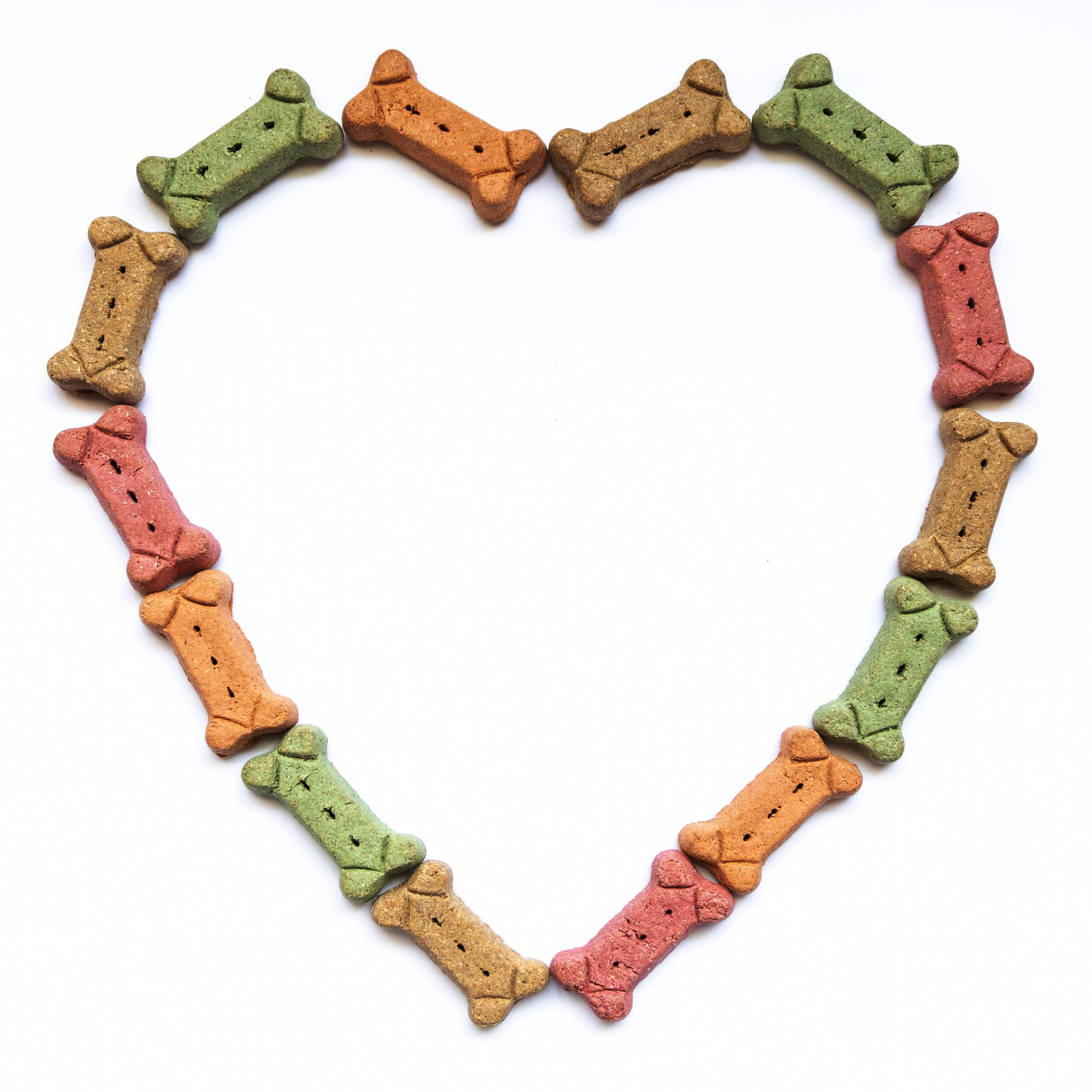 Dog treats in the shape of a heart.