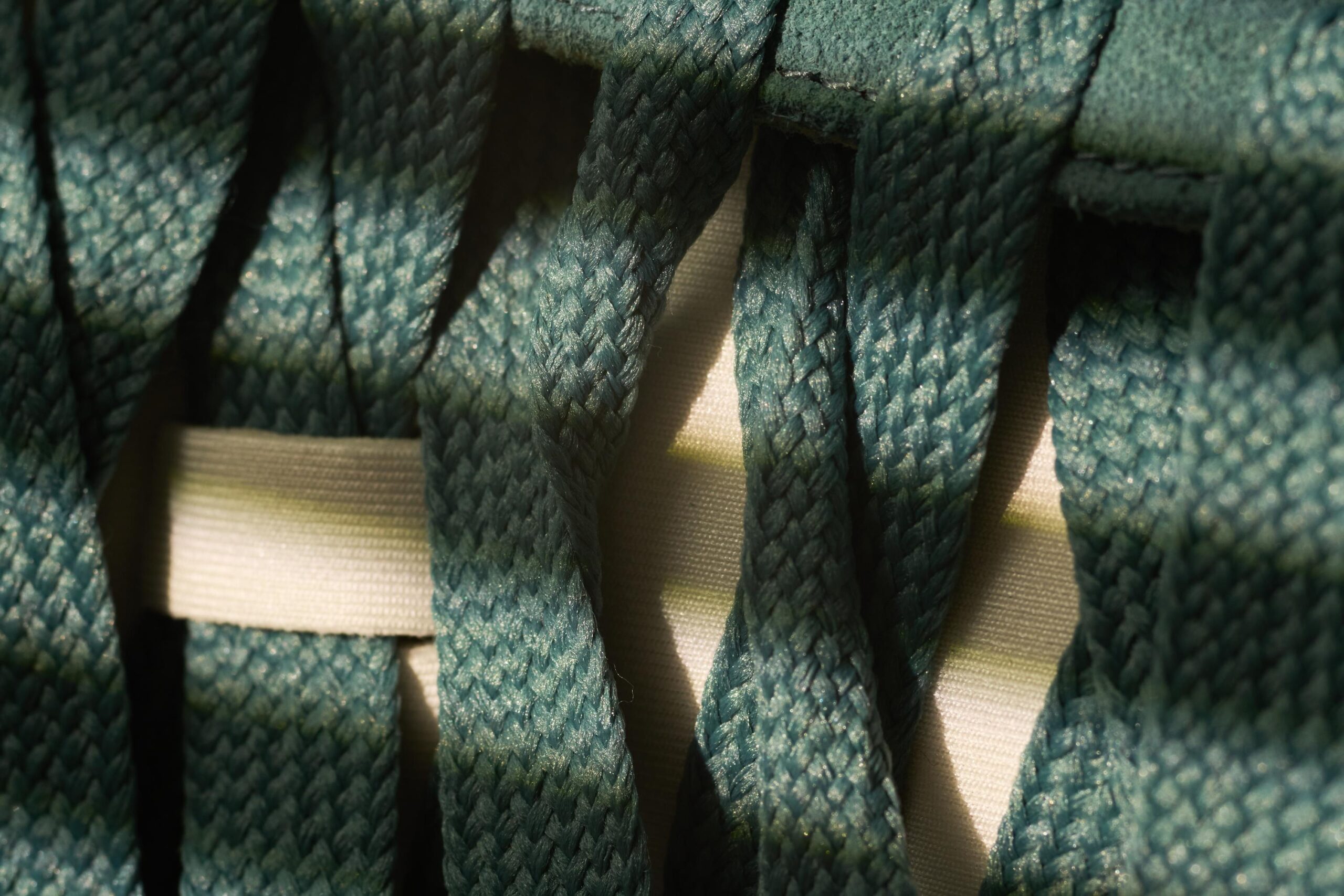 Indepth examination of fabric structure and design. Comprehensive study revealing textures in activewear fabric layers