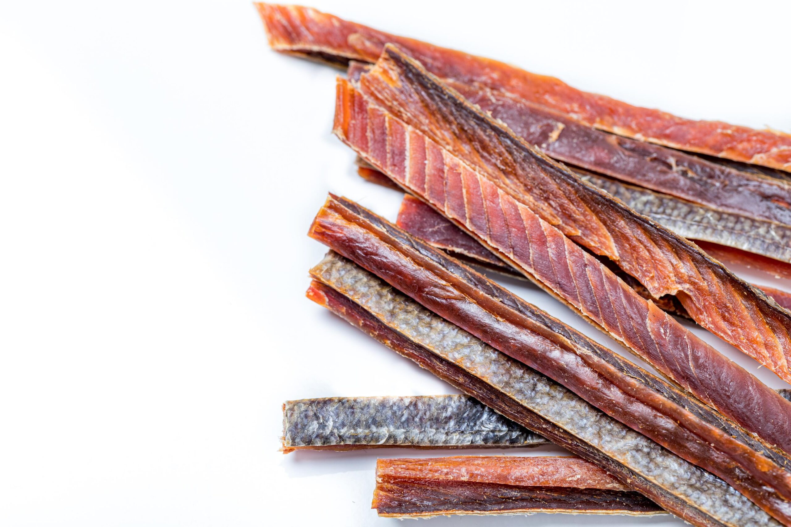 salmon jerky on white background