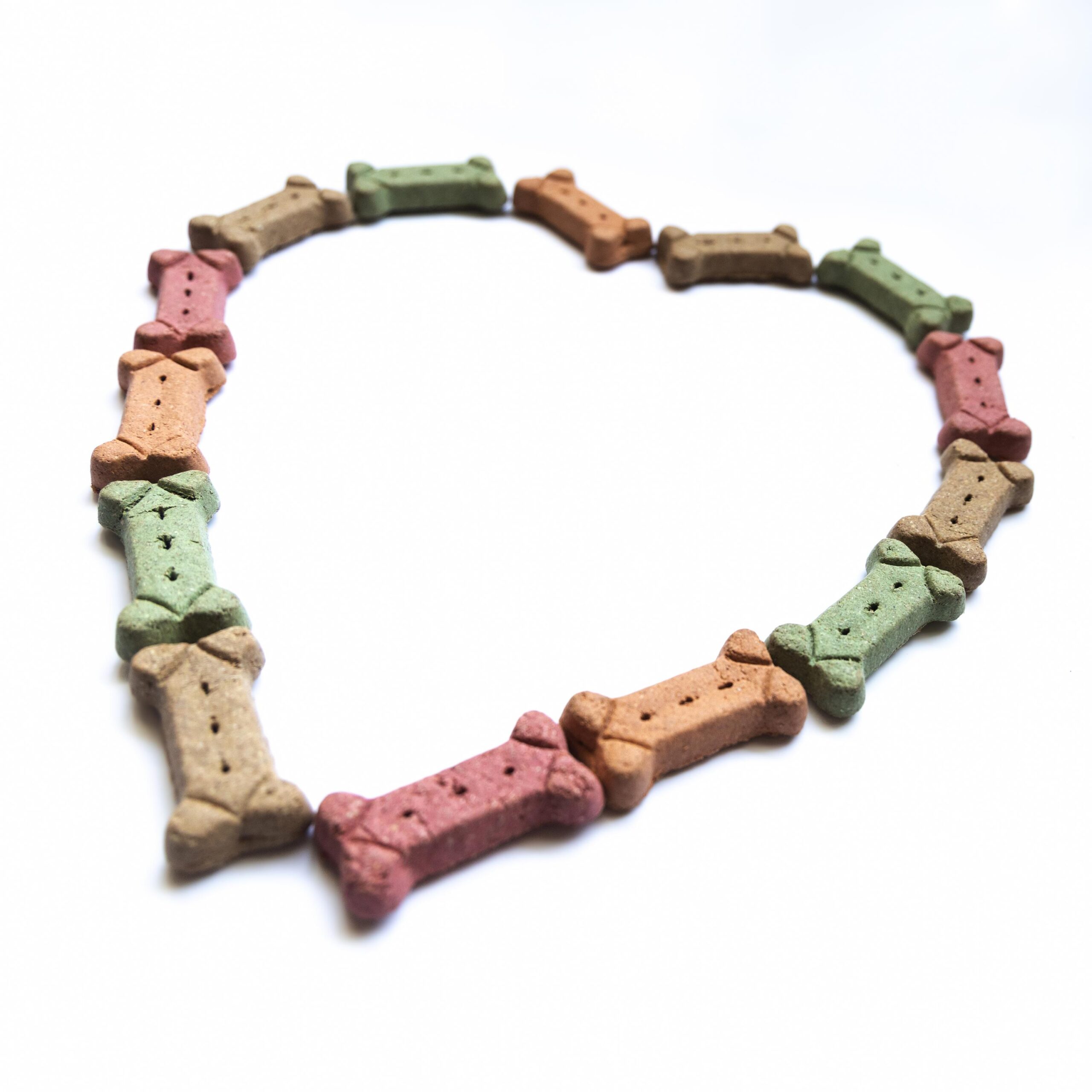 Dog treats in the shape of a heart.